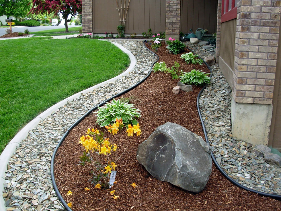 Front yard landscaping using rocks and mulch