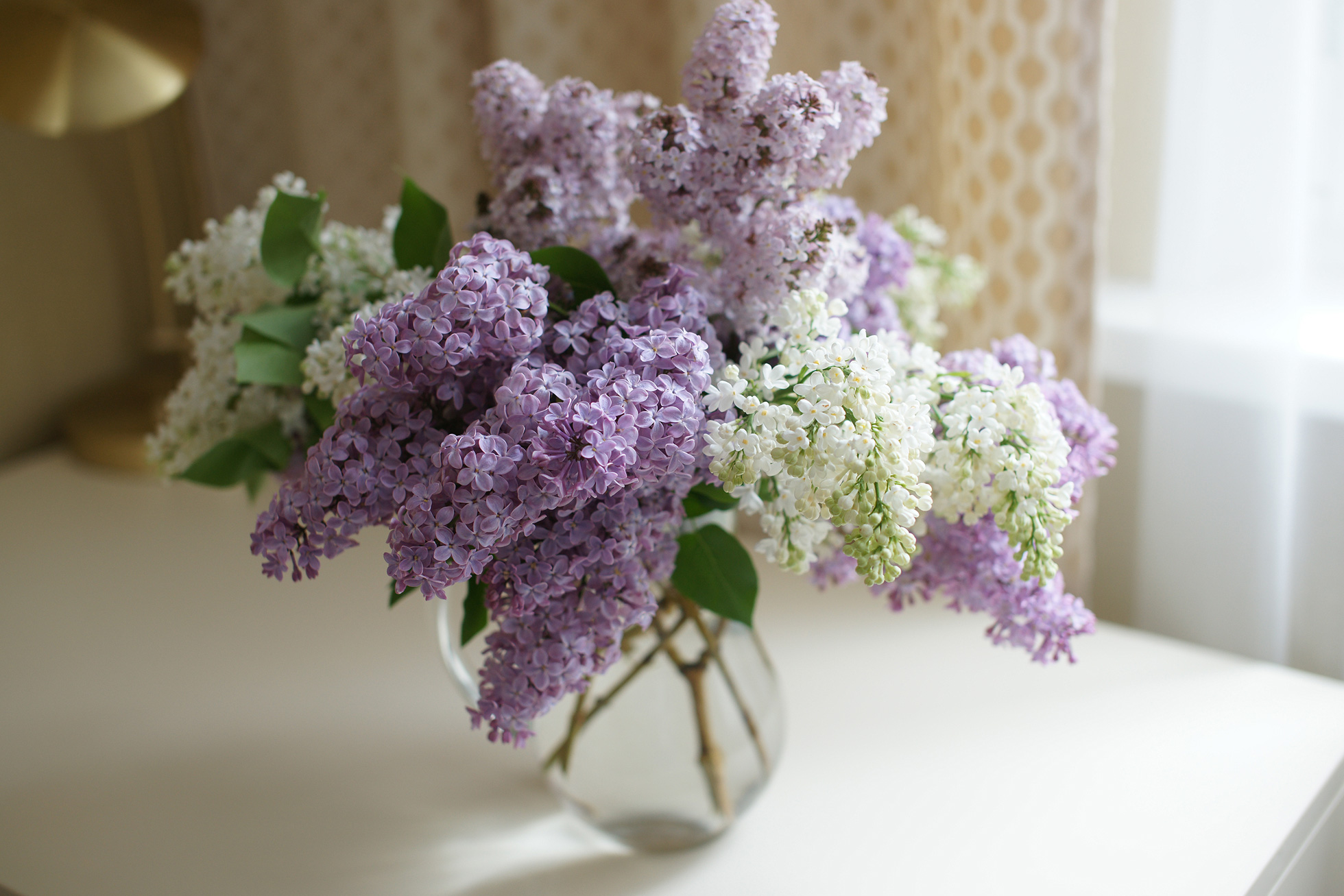 Fresh-cut lilacs in a home for sale